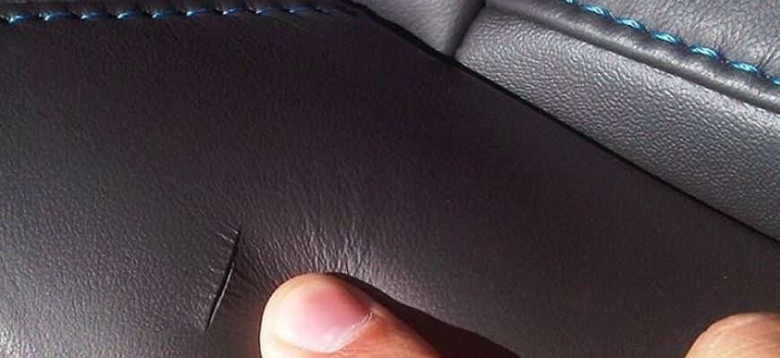 Порез кожаного салона автомобиля